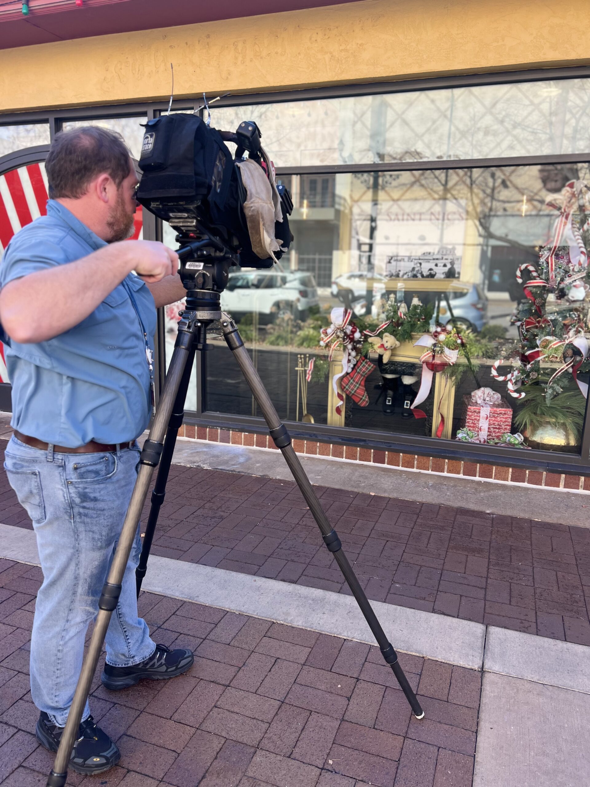Television crew filming a client location